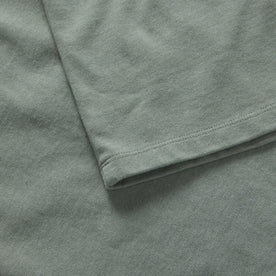 material shot of the sleeve on The Heavy Bag Tee in Slate