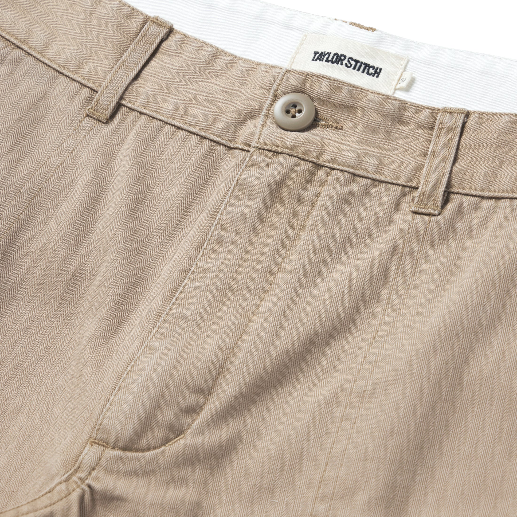 material shot of the button closure on The Trail Short in Khaki Herringbone, Shorts by Taylor Stitch
