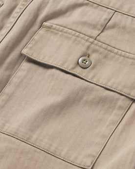 material shot of the rear pocket on The Trail Short in Khaki Herringbone, Shorts by Taylor Stitch