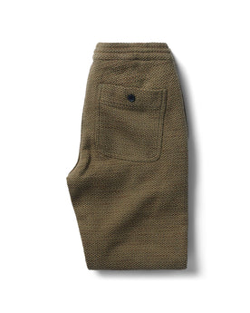 flatlay of the back of The Apres Pant in Cypress Sashiko folded, Bottoms by Taylor Stitch