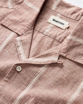 editorial image of The Short Sleeve Hawthorne in Dried Fig Stripe the beach, Wovens by Taylor Stitch