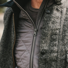close up of our fit model wearing the vertical jacket