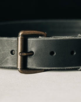 material shot of the belt buckle on The Standard Belt in Black, Accessories by Taylor Stitch