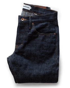 flatlay of The Democratic Jean in Umeda Selvage, Bottoms by Taylor Stitch