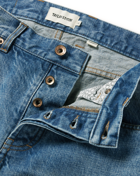 material shot of the button closures on The Democratic Jean in Patch Wash Selvage, Bottoms by Taylor Stitch