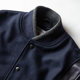 material shot of thr collar on The Golden Bear Snap Bomber in Midnight Wool