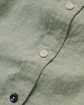 material shot of the buttons on The Short Sleeve California in Army Hemp, Wovens by Taylor Stitch