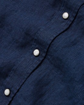 material shot of the buttons on The Short Sleeve Western in Indigo Linen, Wovens by Taylor Stitch