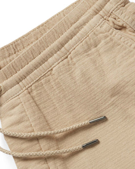 material shot of the waistband and drawstring on The Apres Pant in Khaki Double Cloth, Bottoms by Taylor Stitch