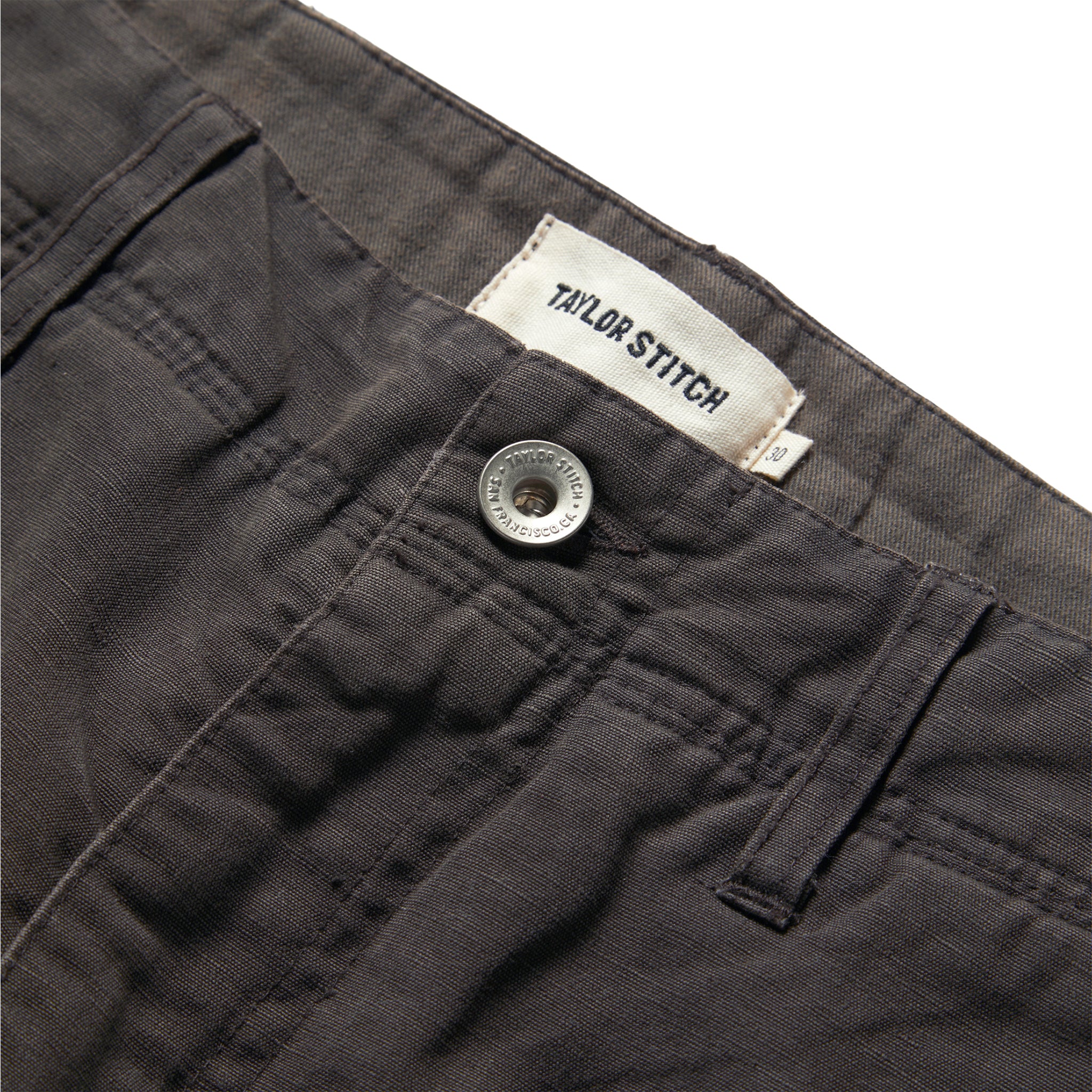 material shot of the button on The Morse Short in Dark Charcoal Linen, Shorts by Taylor Stitch