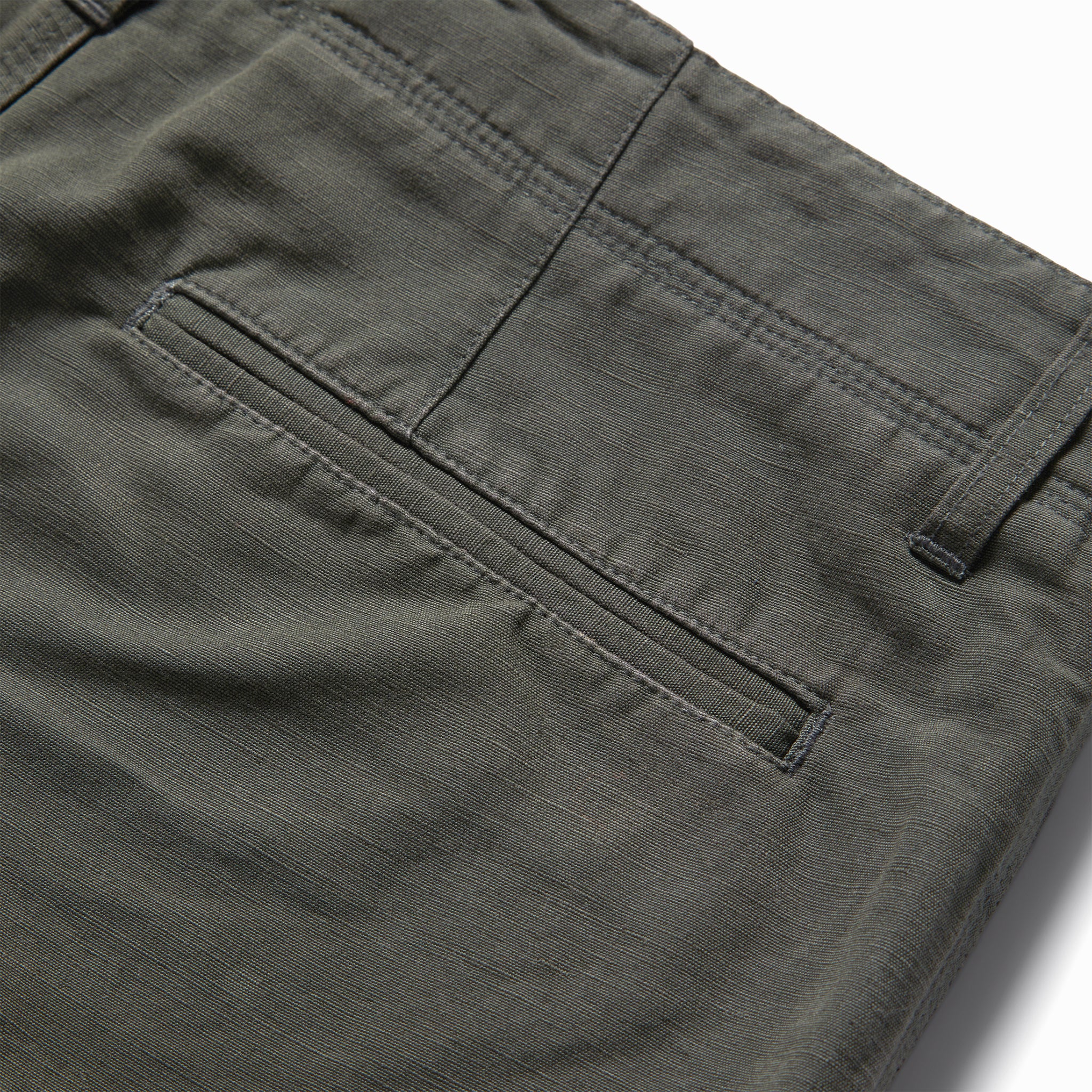 material shot of the rear pocket on The Morse Short in Dark Slate Linen, Shorts by Taylor Stitch