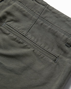 material shot of the rear pocket on The Morse Short in Dark Slate Linen, Shorts by Taylor Stitch