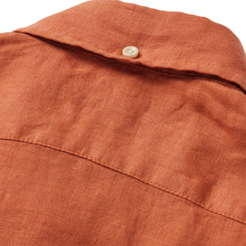 material shot of the rear collar button on The Jack in Apricot Linen