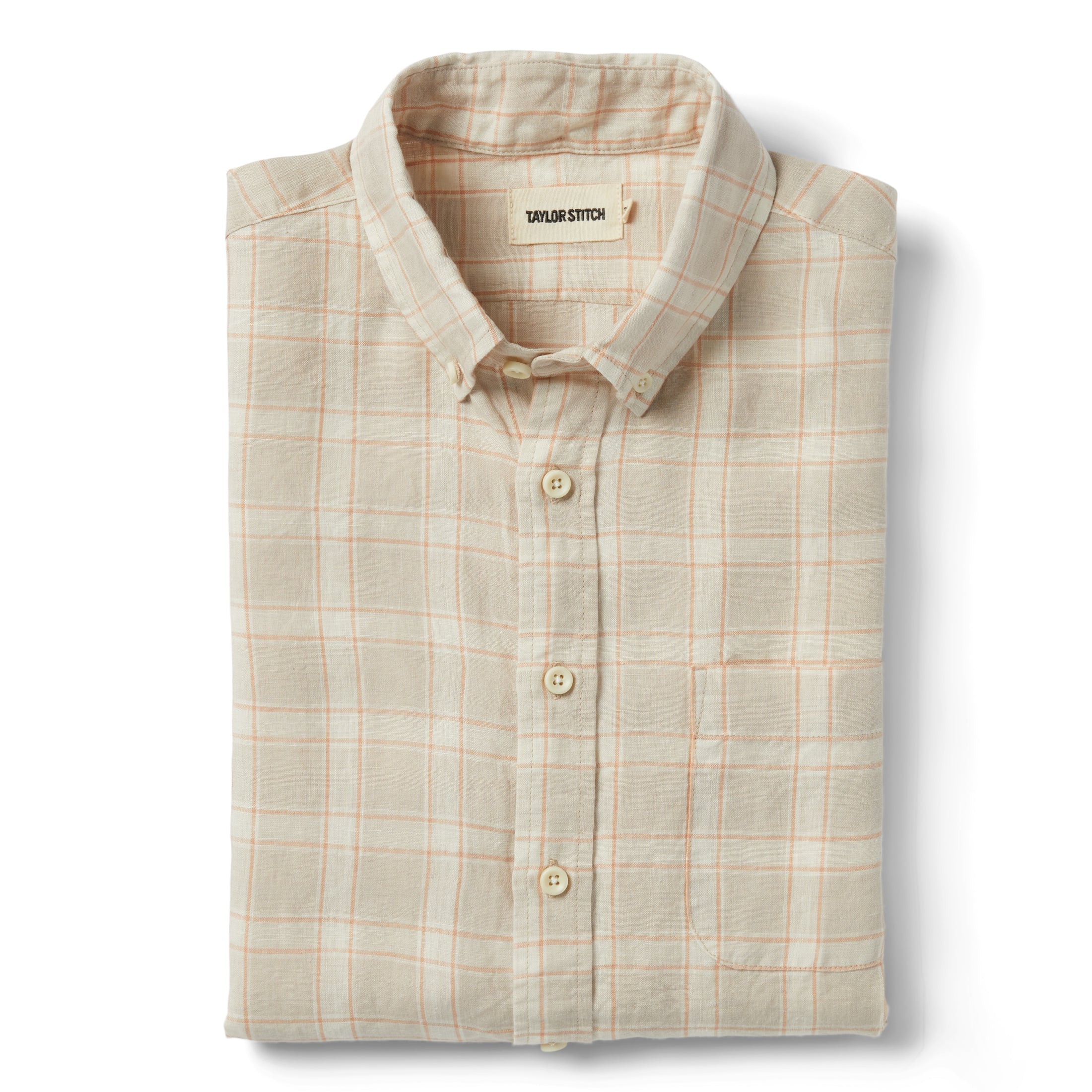 flatlay of The Jack in Dune Plaid, folded, Wovens by Taylor Stitch