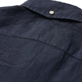 material shot of the rear collar button on The Jack in Navy Linen
