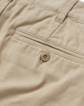 material shot of the back pocket on The Foundation Short in Khaki Twill, Bottoms by Taylor Stitch