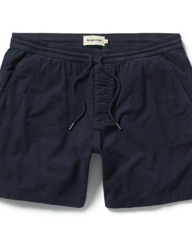 flatlay of The Après Short in Dark Navy Pinwale, Shorts by Taylor Stitch