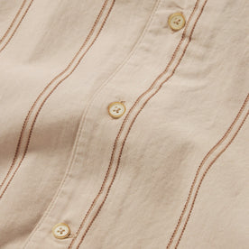 material shot of the buttons on The Tulum in Latte Stripe