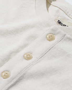 material shot of the buttons on The Heavy Bag Henley in Natural, Knits by Taylor Stitch