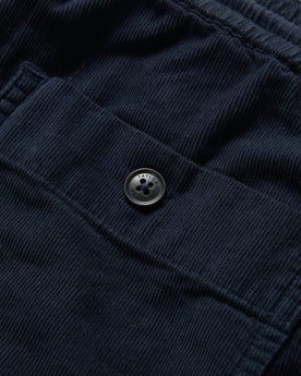 material shot of the back pocket on The Après Short in Dark Navy Pinwale, Shorts by Taylor Stitch