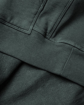 material shot of the hem of The Fillmore Snap Hoodie in Deep Sea Terry, Knits by Taylor Stitch