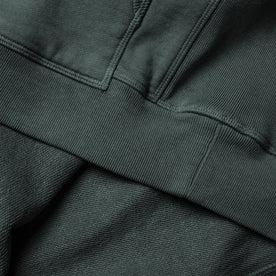 material shot of the hem of The Fillmore Snap Hoodie in Deep Sea Terry