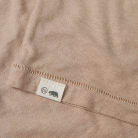 material shot of the hem logo of The Cotton Hemp Tee in Khaki