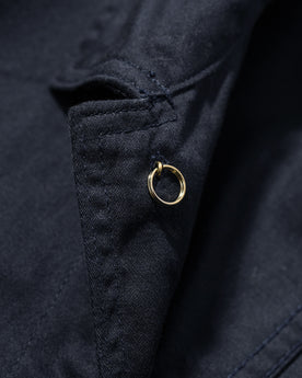 material shot of the interior button on The Ojai Jacket in Indigo, Outerwear by Taylor Stitch
