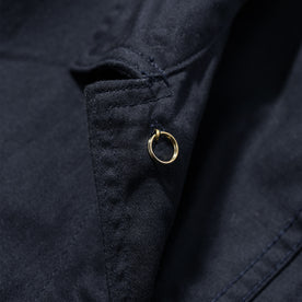 material shot of the interior button on The Ojai Jacket in Indigo