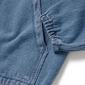 material shot of the elastic cuff on The Riptide Jacket in Washed Indigo Twill