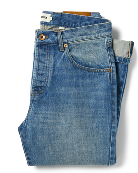 flatlay of The Slim Jean in Patch Wash Selvage, folded from the front, Bottoms by Taylor Stitch