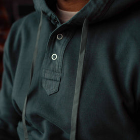 fit model showing a closeup of The Fillmore Snap Hoodie in Deep Sea Terry