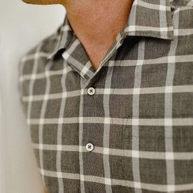 fit model posing in The Short Sleeve Hawthorne in Espresso Plaid