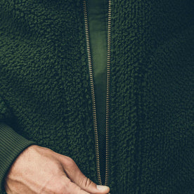 Zip detail show by our fit model wearing the Truckee Jacket