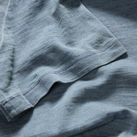 material shot of the sleeve on The Organic Cotton Tee in Dyed Indigo