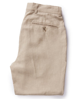 flatlay of The Sheffield Trouser in Natural Linen, shown folded from the back, Bottoms by Taylor Stitch
