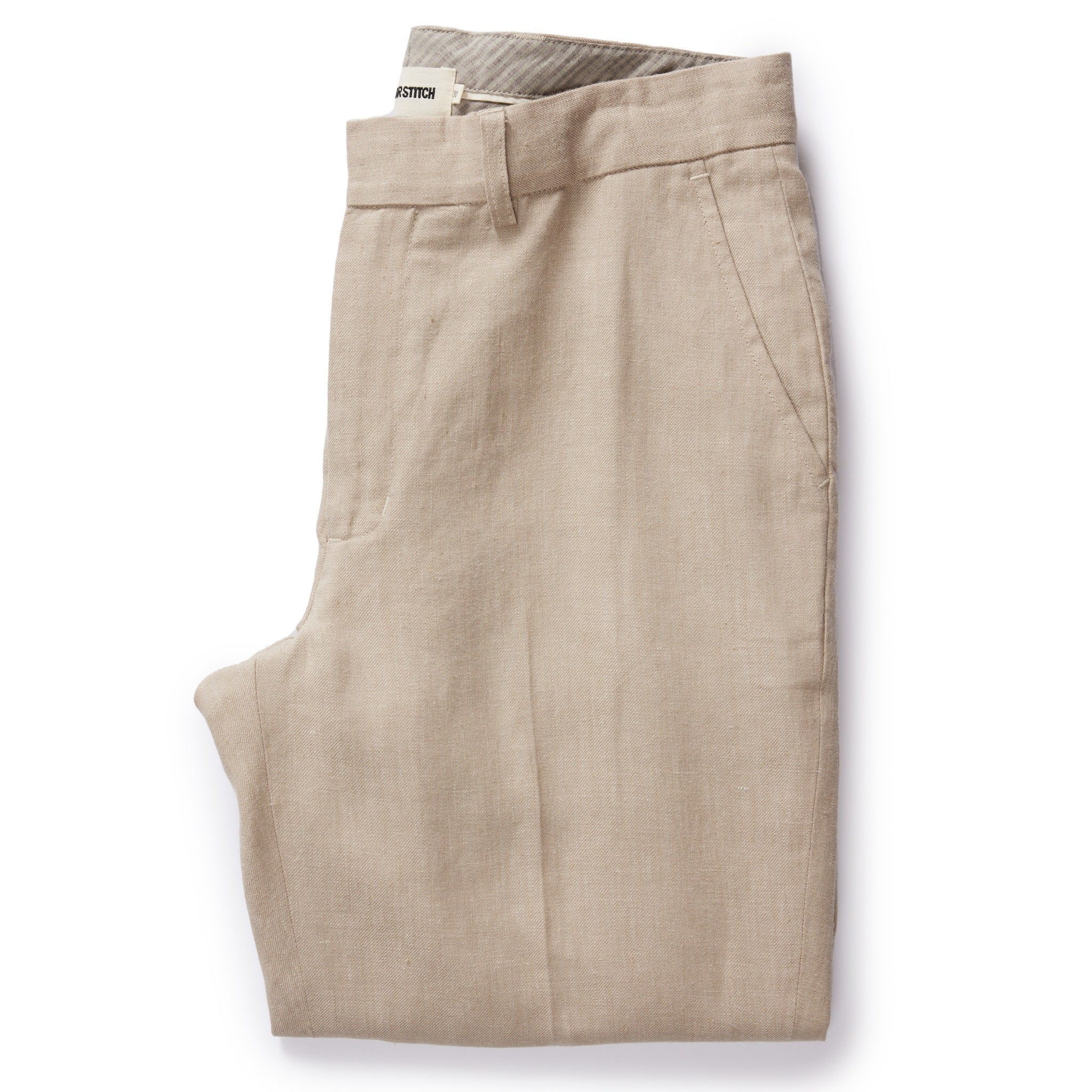 flatlay of The Sheffield Trouser in Natural Linen, Bottoms by Taylor Stitch