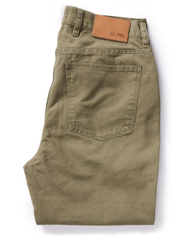 flatlay of The Slim All Day Pant in Arid Eucalyptus Canvas, shown folded from the back, Bottoms by Taylor Stitch