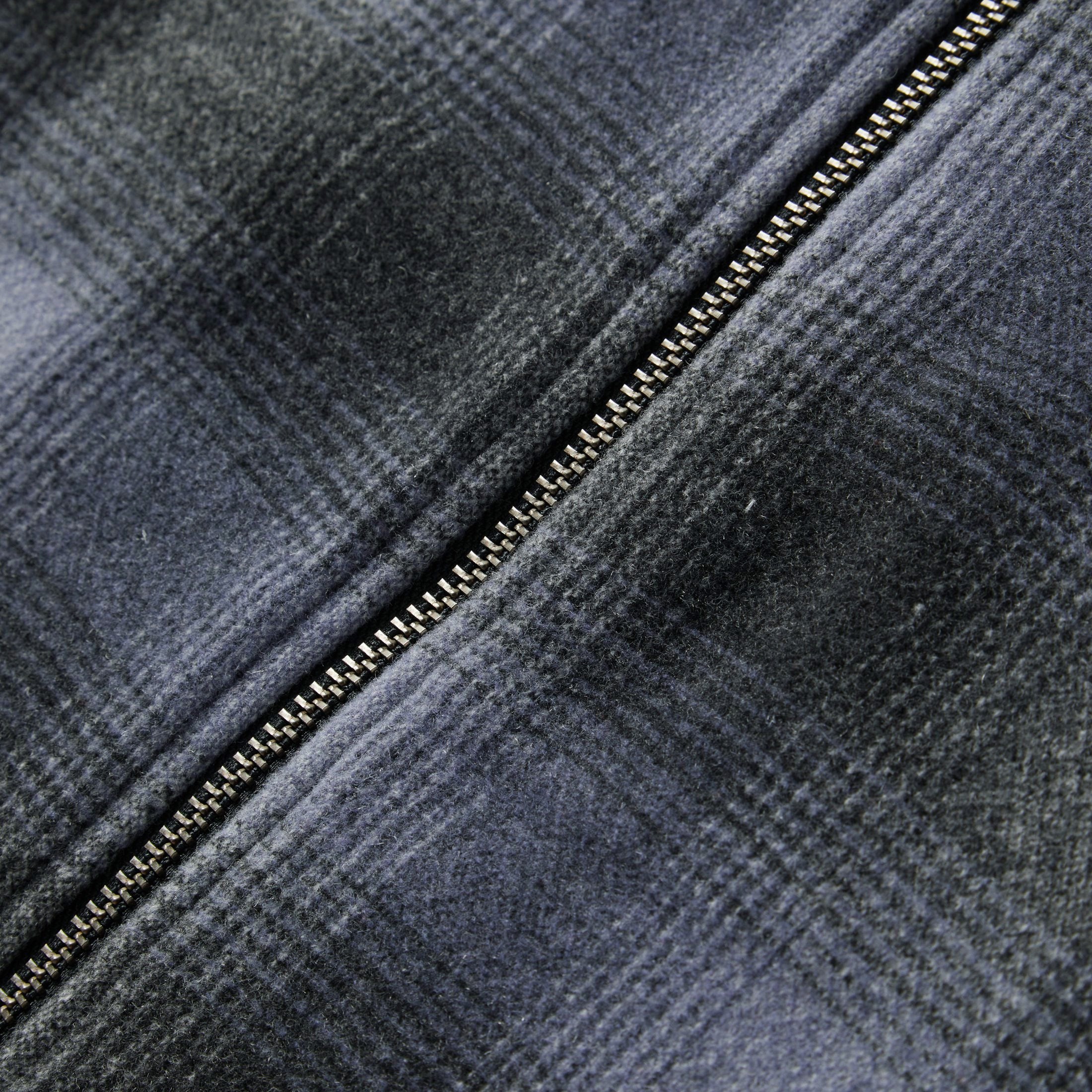 material shot of the zipper on The Wyatt Jacket in Ash Plaid Wool, Outerwear by Taylor Stitch