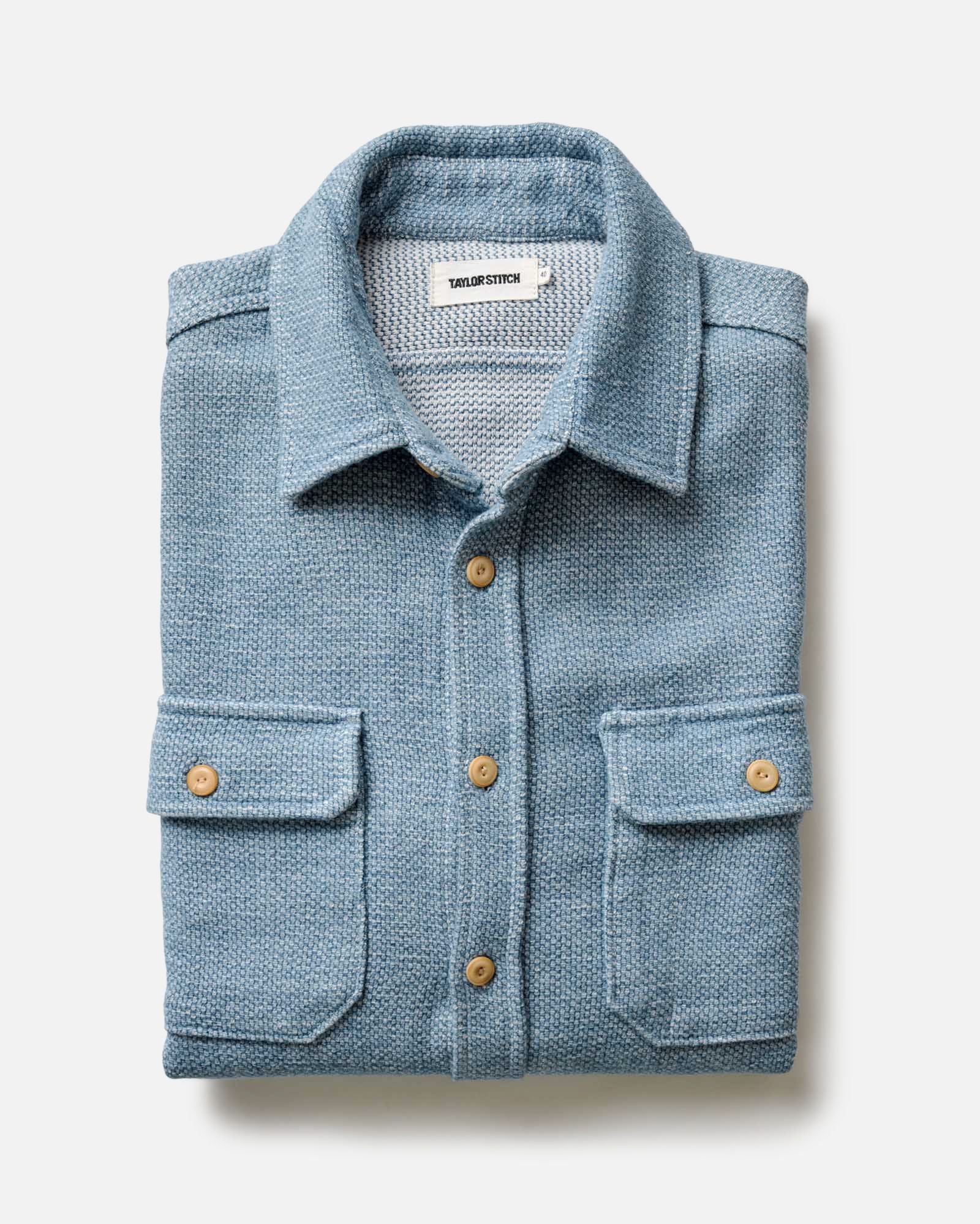 flatlay of The Division Shirt in Washed Indigo folded, Wovens by Taylor Stitch