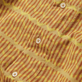 material shot of the buttons on The Short Sleeve Hawthorne in Gold Wave