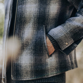 fit model with his hands in the pocket of The Wyatt Jacket in Ash Plaid Wool