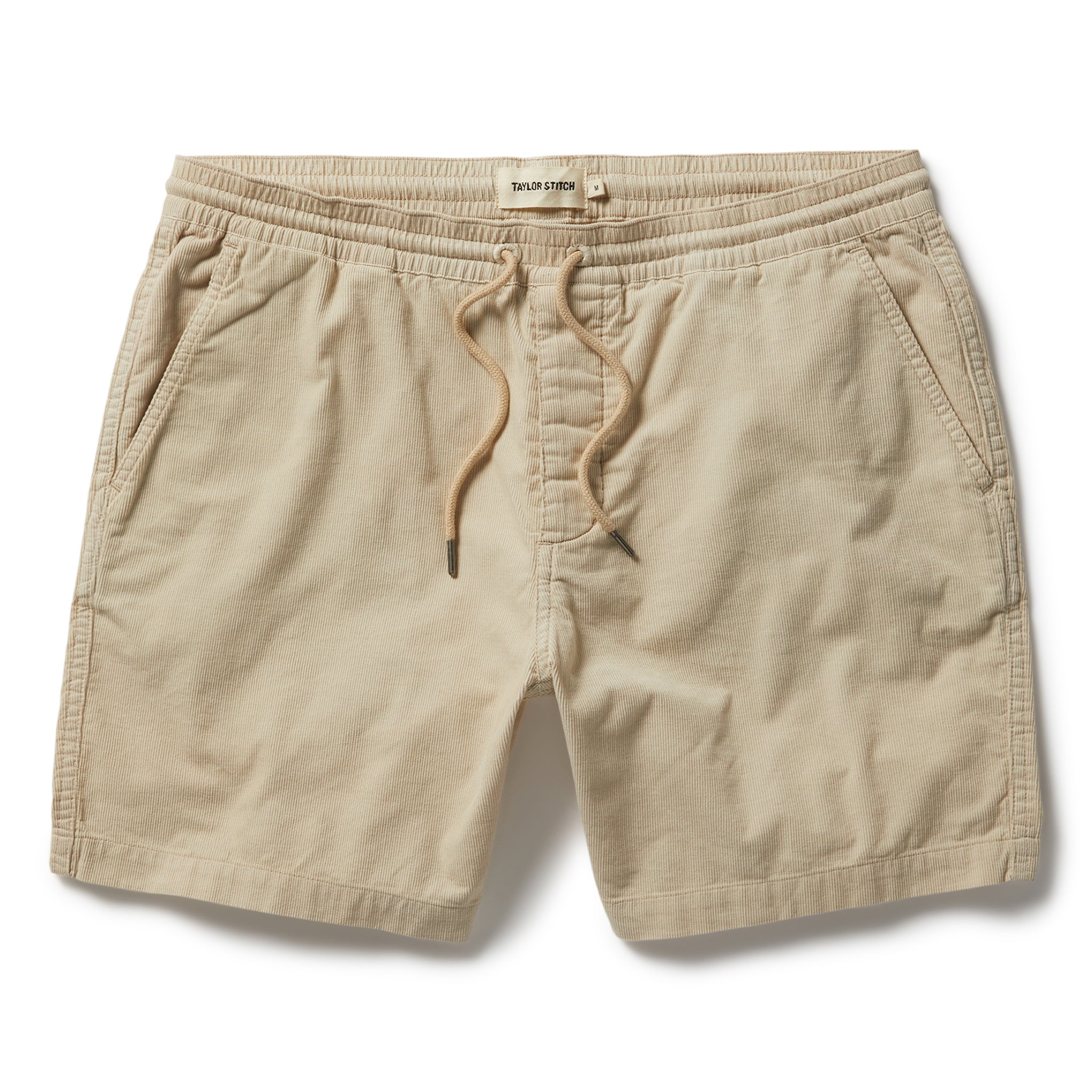 flatlay of The Après Short in Natural Pinwale, Shorts by Taylor Stitch
