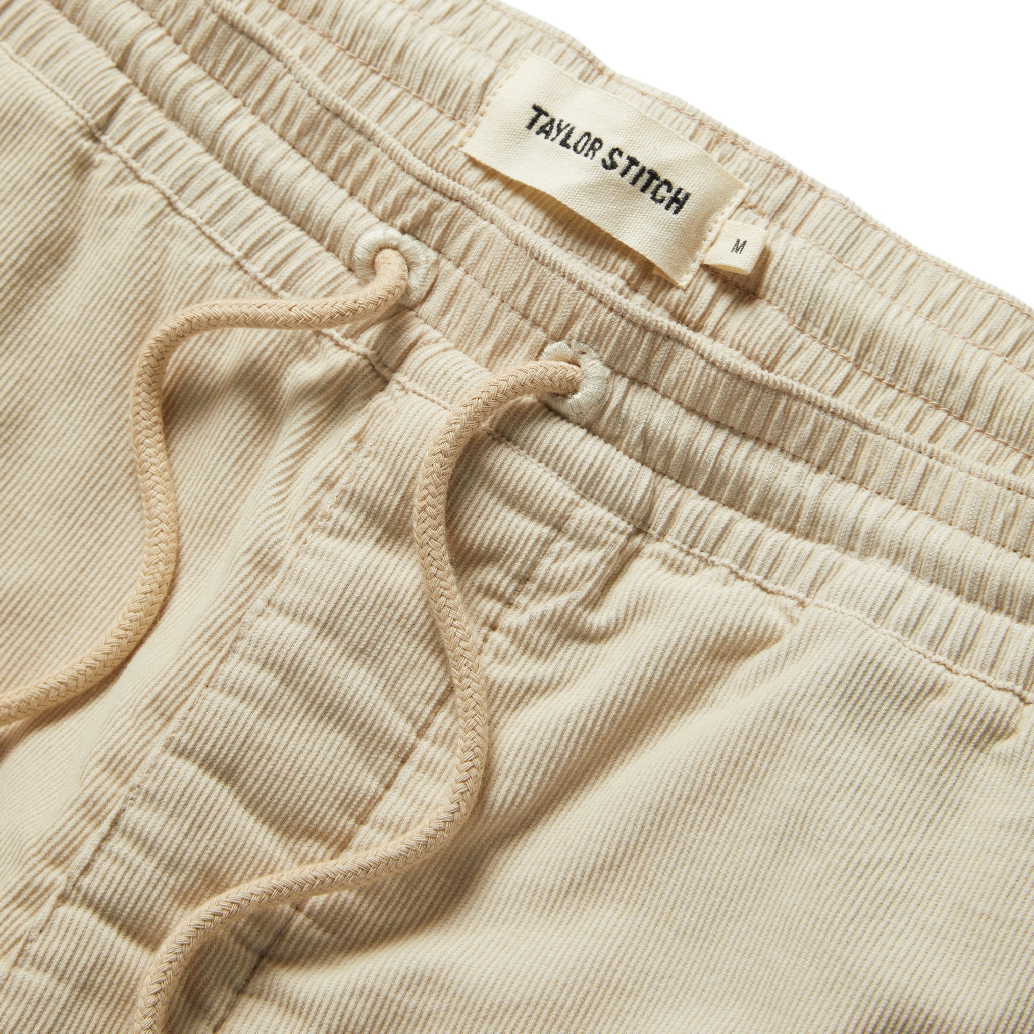material shot of the waistband on The Après Short in Natural Pinwale, Shorts by Taylor Stitch