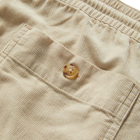 material shot of the back pocket on The Après Short in Natural Pinwale