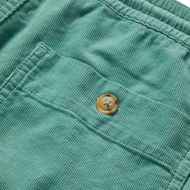 material shot of the back pocket on The Après Short in Ocean Pinwale