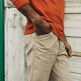 fit model posing with his hand in the pocket of The Camp Pant in Sand Boss Duck