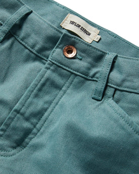 material shot of the button and fly opening of The Chore Pant in Ocean Boss Duck, Bottoms by Taylor Stitch