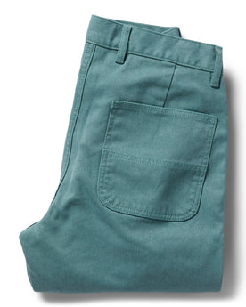 flatlay of The Chore Pant in Ocean Boss Duck, shown folded, Bottoms by Taylor Stitch