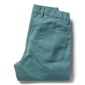 flatlay of The Chore Pant in Ocean Boss Duck, shown folded